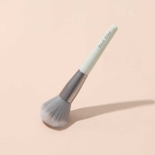 Image of Baseblue Mini Soft Brush, a compact travel-sized makeup brush for on-the-go beauty routines.